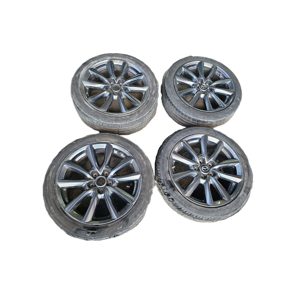 9965B57080 R18 SET 4 CERCHI IN LEGA MAZDA 3 (BP)(2019>) SENZA GOMME