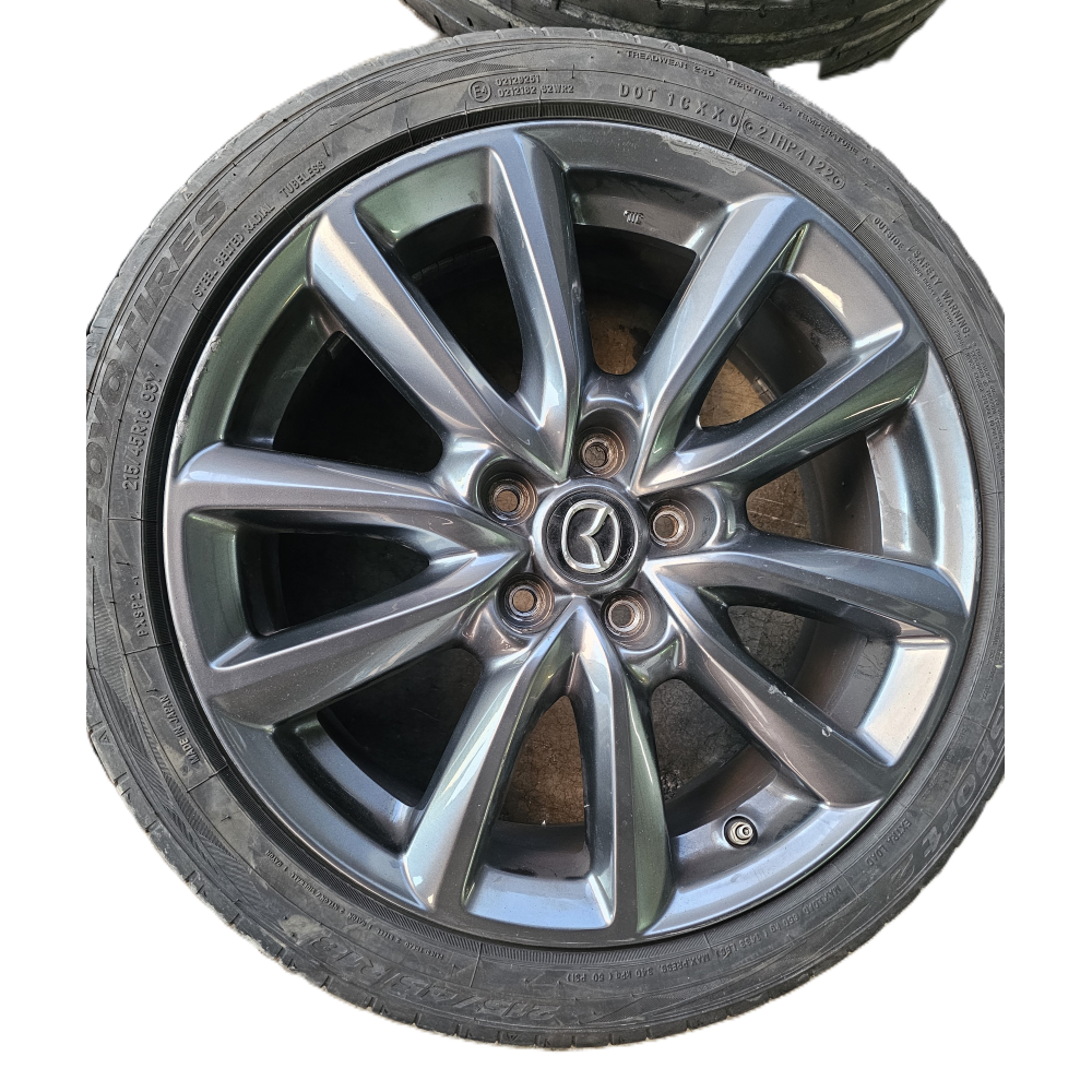 9965B57080 R18 SET 4 CERCHI IN LEGA MAZDA 3 (BP)(2019>) SENZA GOMME